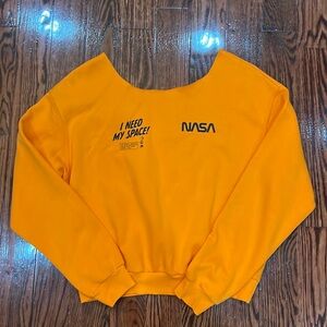 Red skeleton zip up size S and orange nasa crewneck cut off shoulder size S